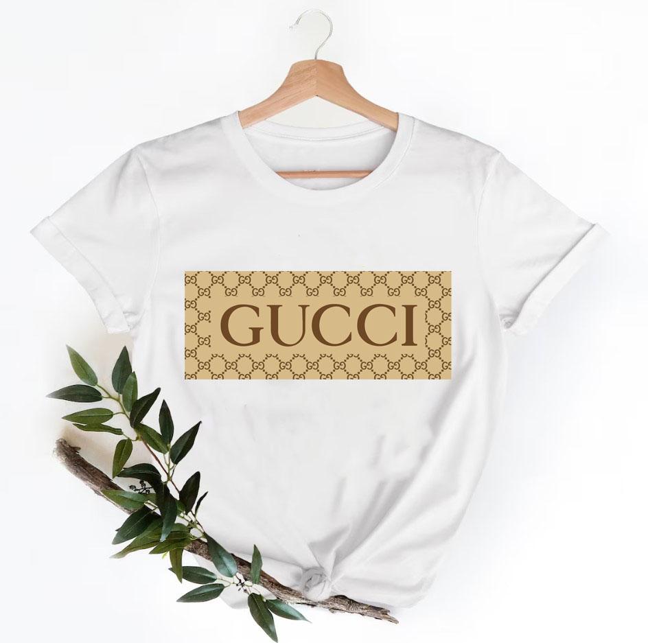 Gucci-Shirt-Gucci-Logo-T-Shirt-Unisex-Fashion-Gucci-Shirt-Gucci-Tee-Gucci-Luxury-Tshirt-LTS115 Gucci Shirt